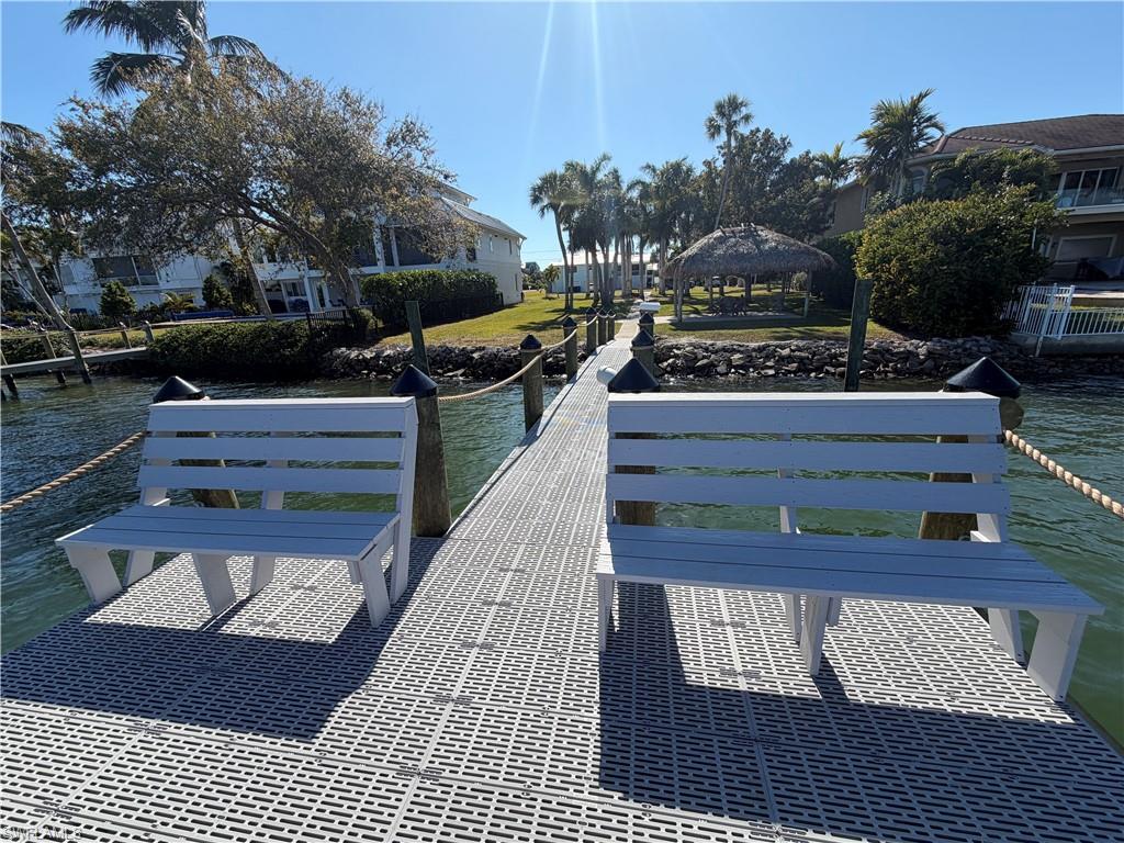 Dock with a water view and a gazebo