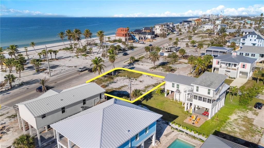 Birds eye view of property with a water view VIRTUALLY EDITED