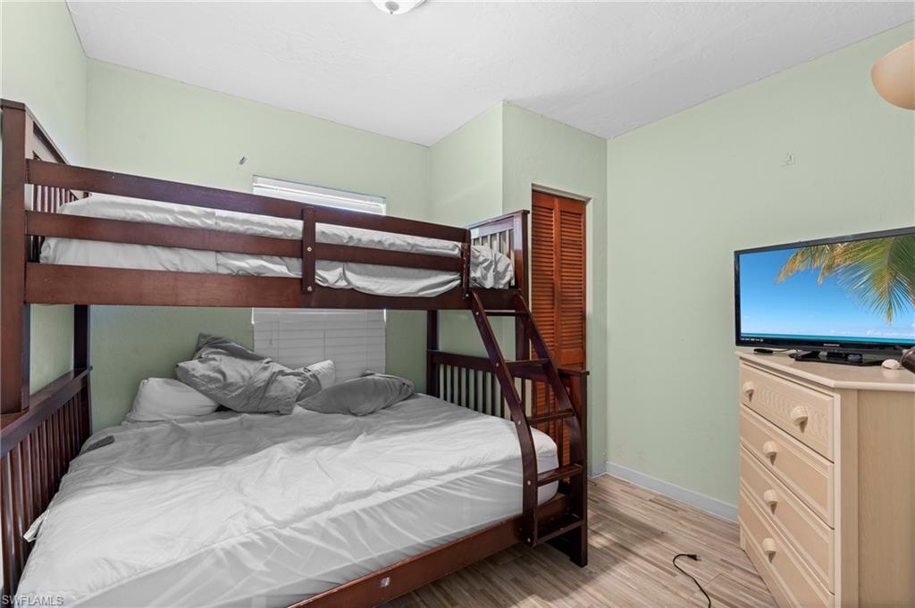 Bedroom with a twin-over-full bunk bed - Virtually Edited Image
