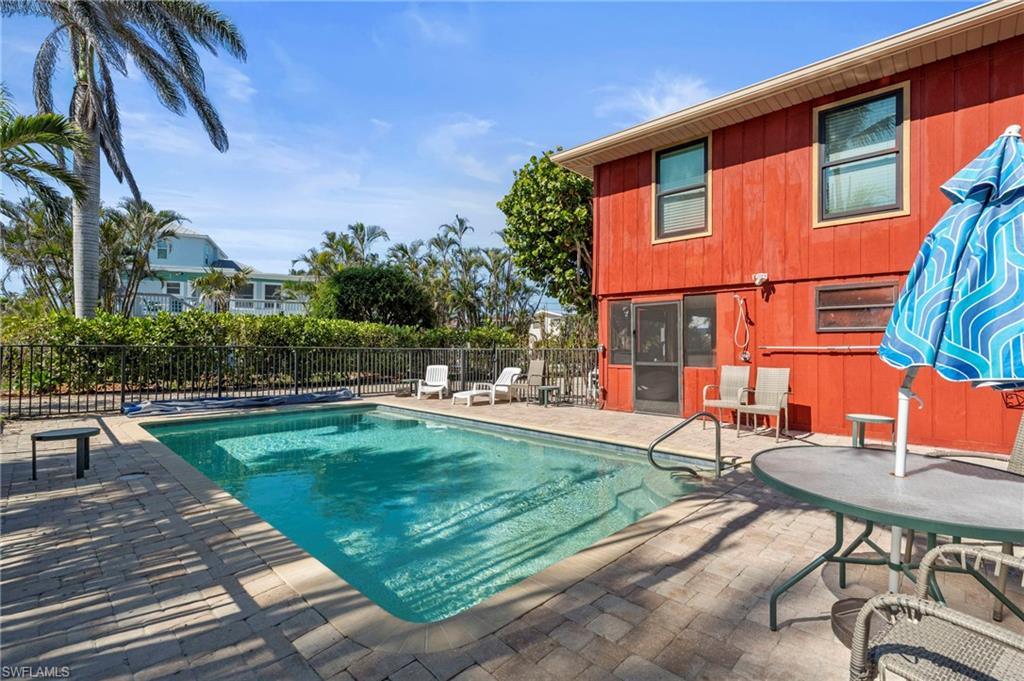 Plenty of room to Relax-View of pool and a patio  - Virtually Edited Exterior Image