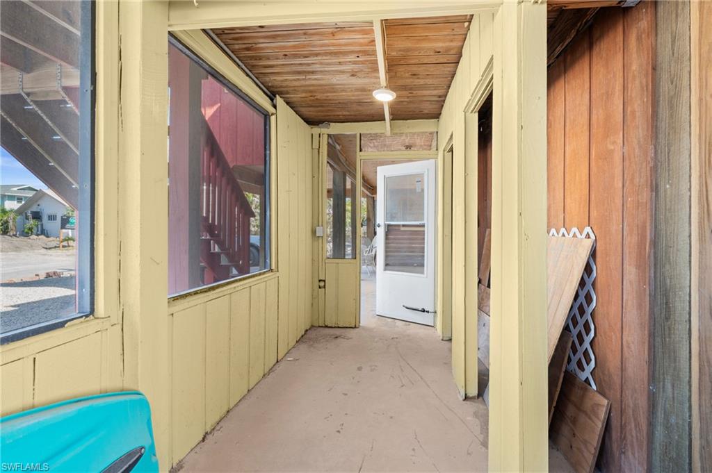 Screened-in storage or utility area  - Virtually Edited Image