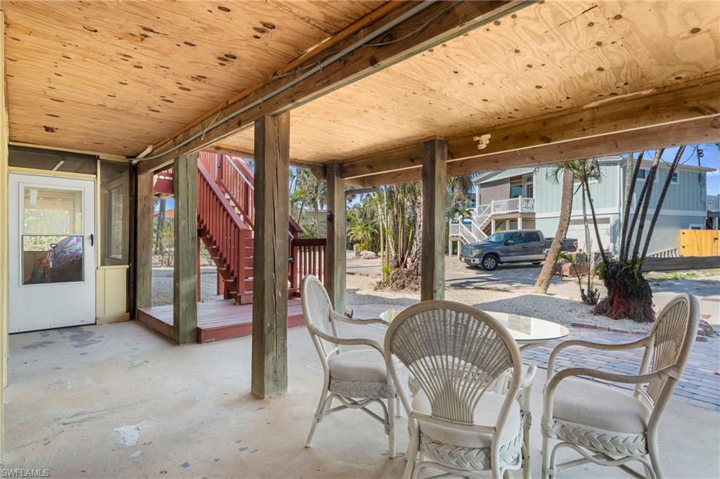 View of patio featuring stairway - Virtually Edited Exterior Image