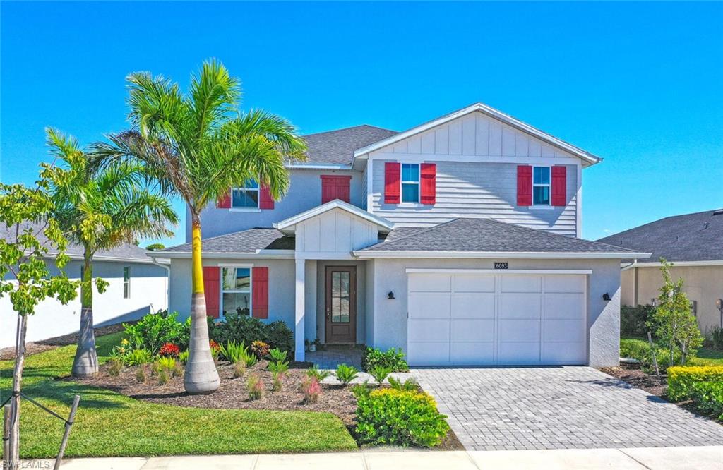 Expansive lakefront lot on Preservation Way with spacious 4,085+ sq ft of modern luxury living.