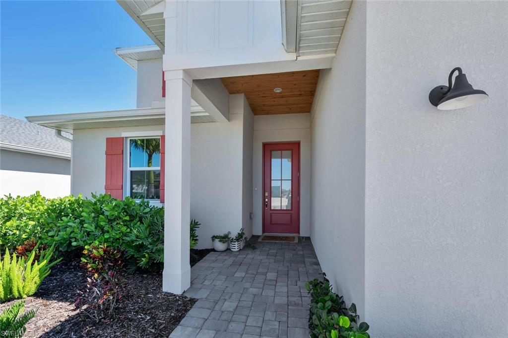 Expansive lakefront lot on Preservation Way with spacious 4,085+ sq ft of modern luxury living.