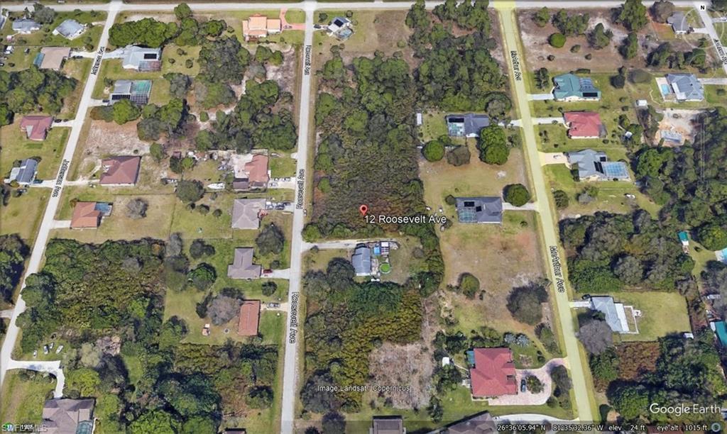 Aerial Property View. Showing the property at 12 Roosevelt Ave and surrounding parcels