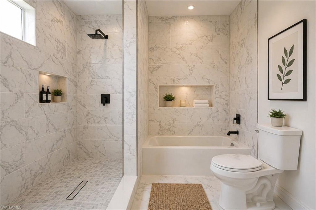 Shower and tub combination featuring marble-finish wall tiling