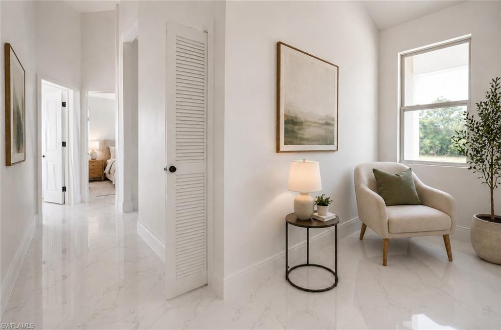 Bright interior space featuring white walls and white tile flooring. Image digitally enhanced and virtually altered; actual property condition may differ.