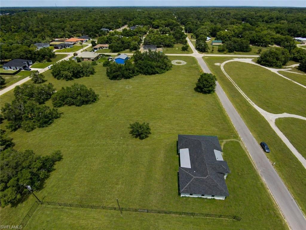 Expansive grassy parcelImage digitally enhanced and virtually altered; actual property condition may differ..