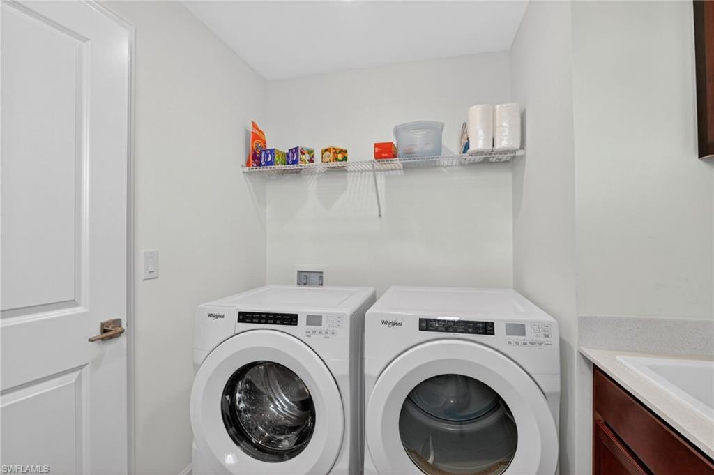 Laundry room has built in Cabinets
