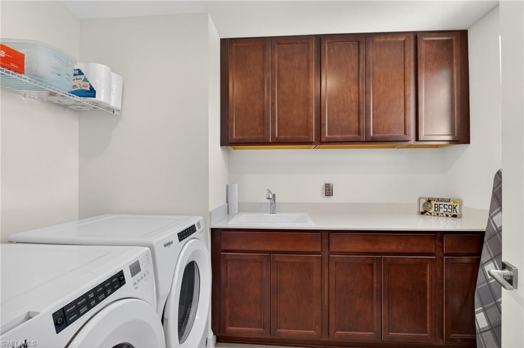 Laundry room built in cabinets and sink