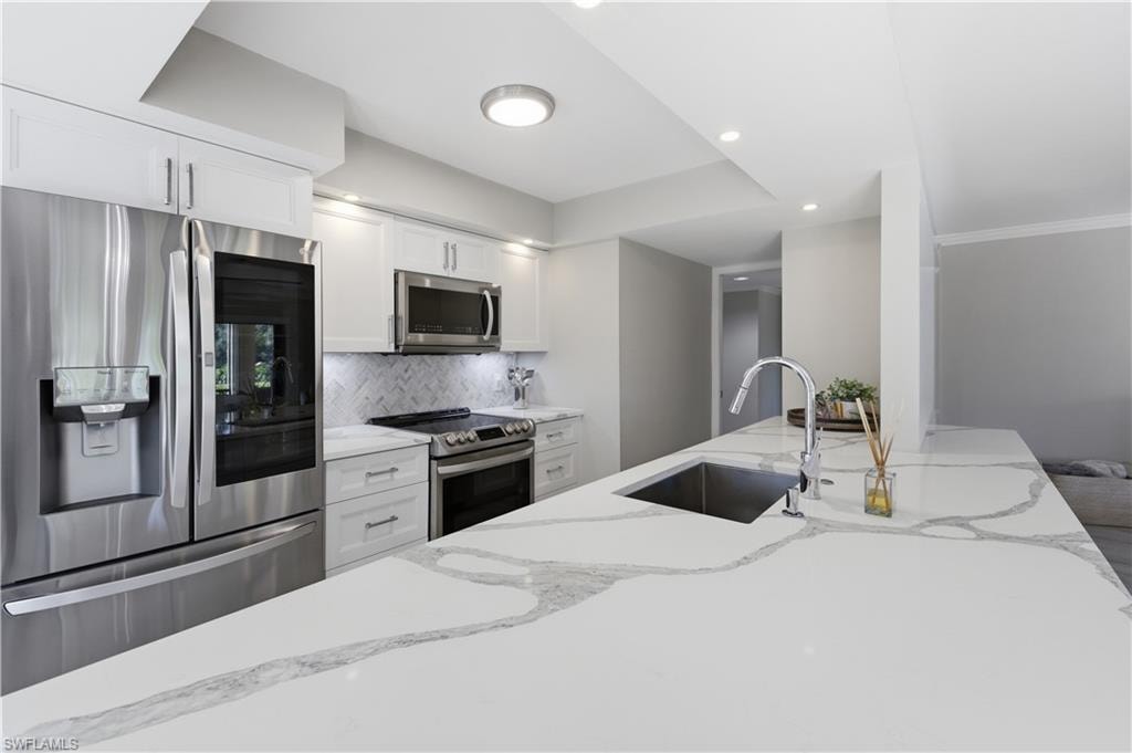 6080 Pelican Bay BLVD 104A photo 13