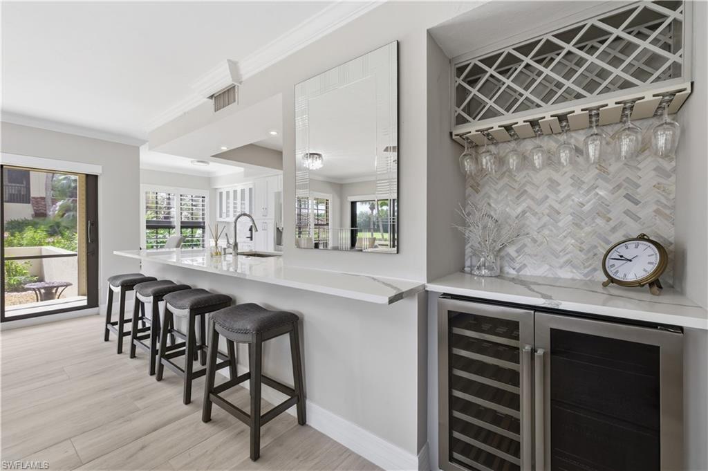 6080 Pelican Bay BLVD 104A photo 9