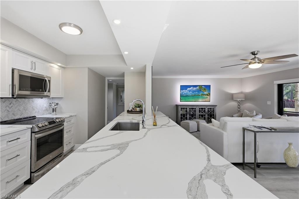 6080 Pelican Bay BLVD 104A photo 14