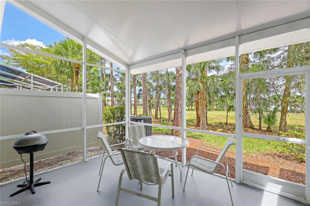 Sunroom / solarium with vaulted ceiling