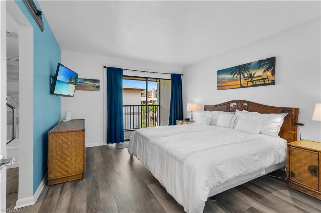 PRIMARY BEDROOM with BALCONY