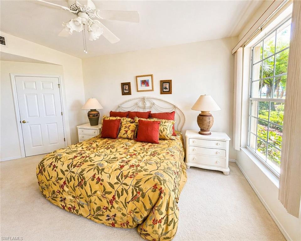 Generous primary suite with large windows and plenty of natural light.