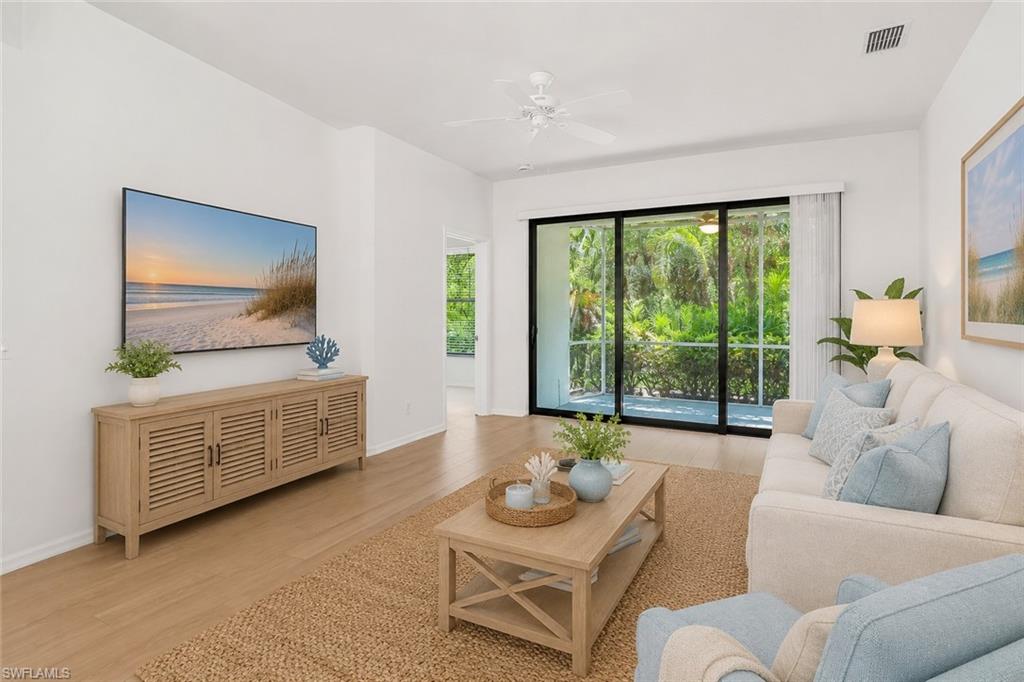 VIRTUALLY STAGED LIVING ROOM VIEW FROM ENTRY
