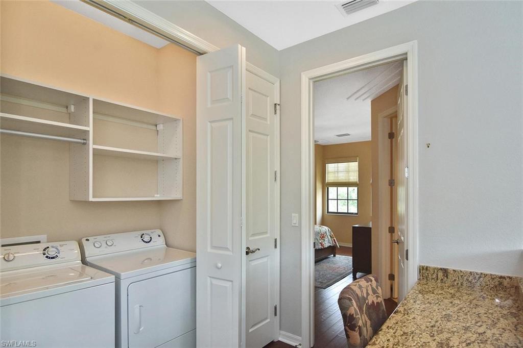 The laundry area is conveniently located between the bedrooms.
