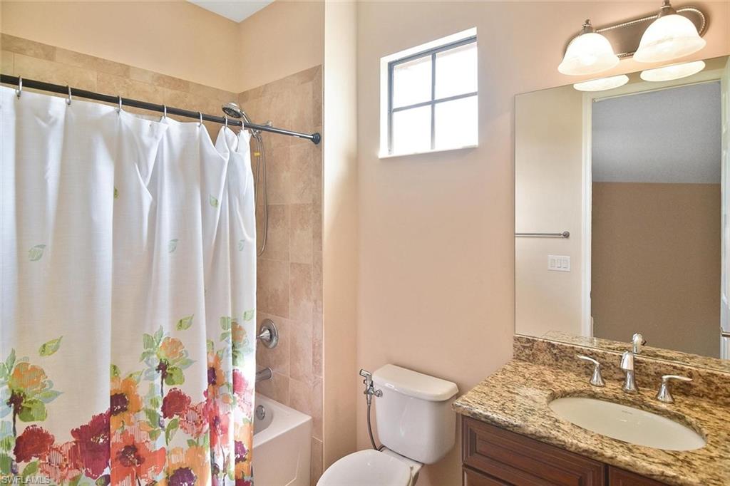 The ensuite bath has a combination tub & shower.