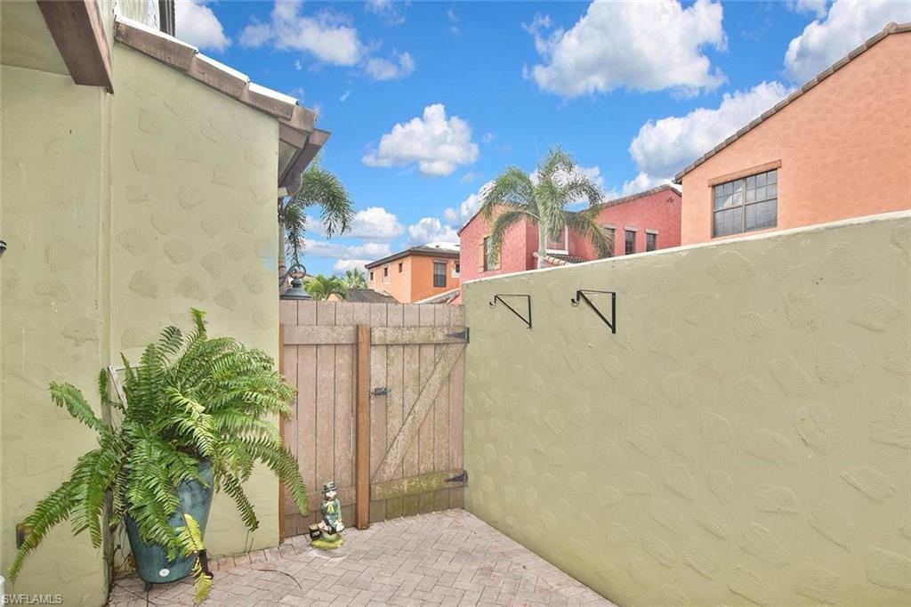 This charming gate opens up right next to your garage.