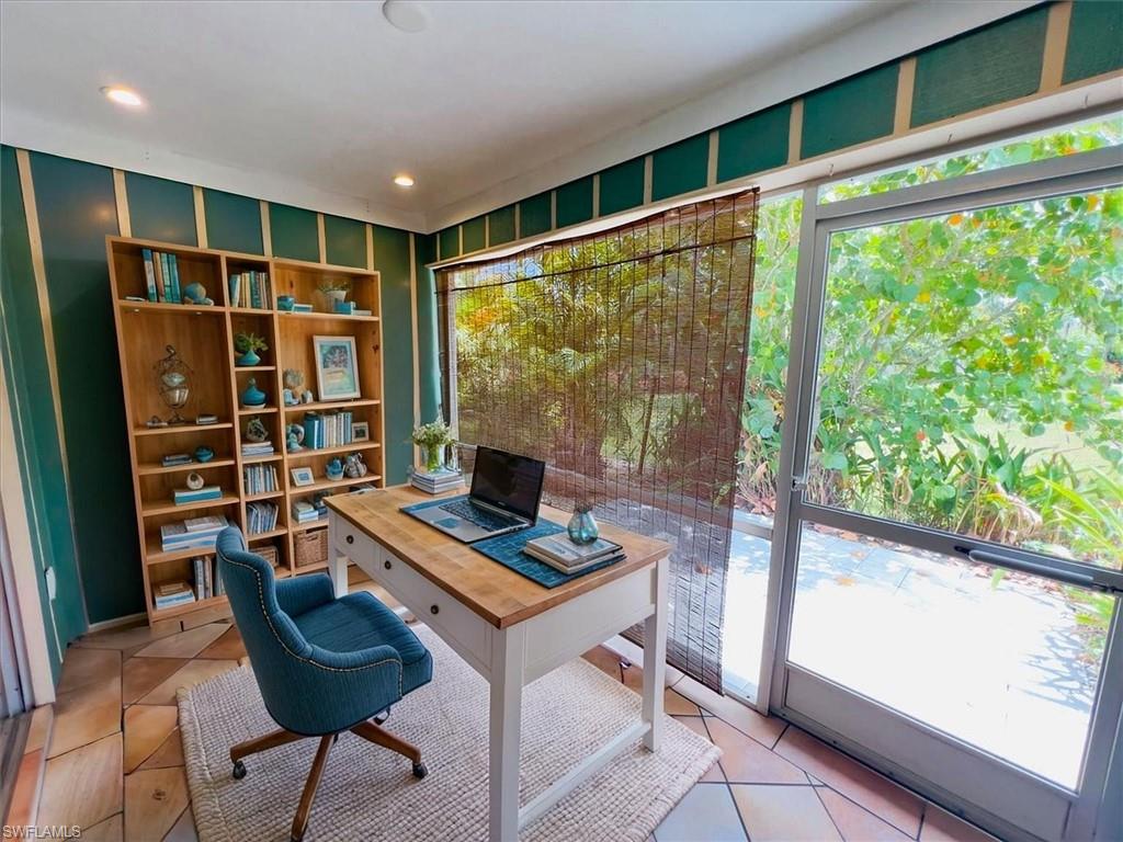Screened-in Lanai option to be used as remote office - Virtually Staged