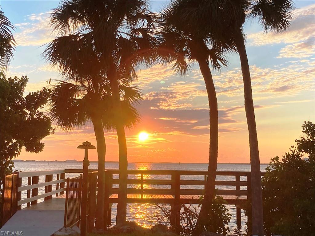 Spectacular Sunset Views along the Community Riverfront Marina, Pavillion, Sandy Beach, Picknic area and Pier.