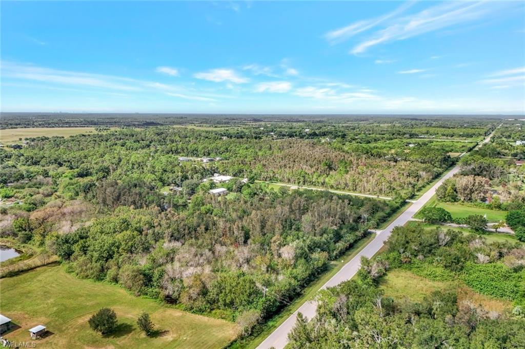 View of property location featuring a heavily wooded area
