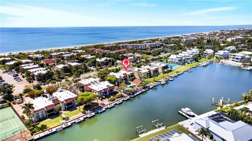 Waterfront community featuring direct Gulf access, private boat docks, and tennis courts