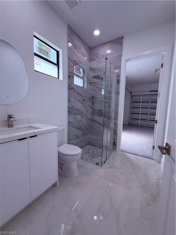 Contemporary bathroom featuring a spacious glass-enclosed shower with marble-look tile surround and a tiled shower pan