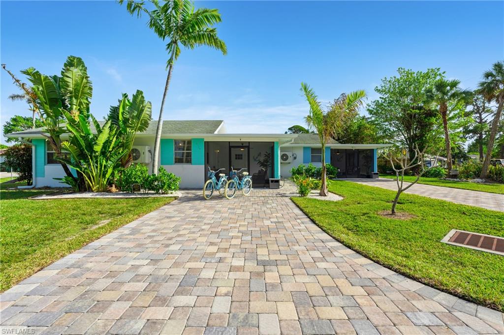 Spacious yard and large driveway with plenty of parking