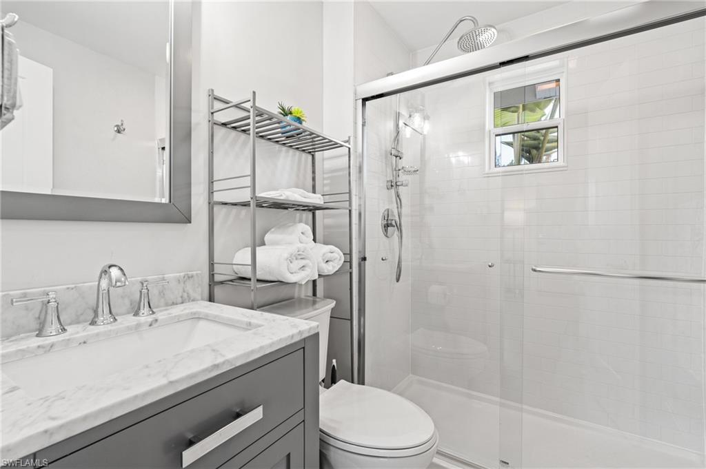 Renovated bathroom: spacious shower with rainhead and sprayer