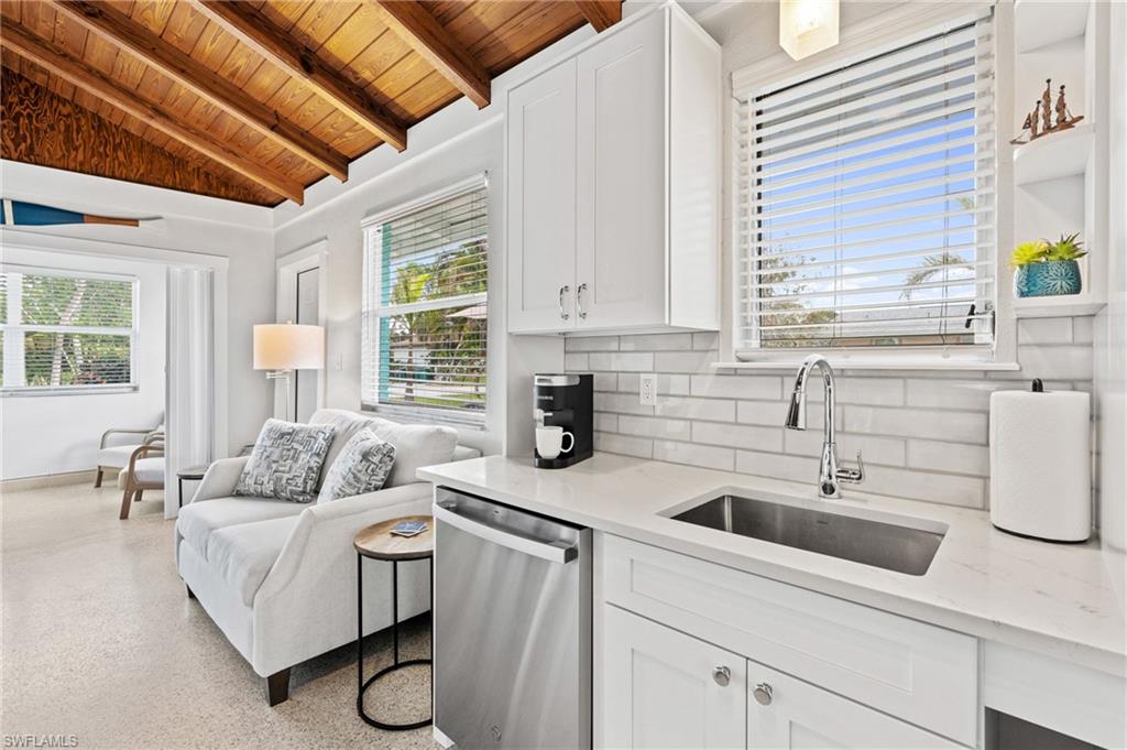 Vaulted ceilings gives an open feeling to this cozy space