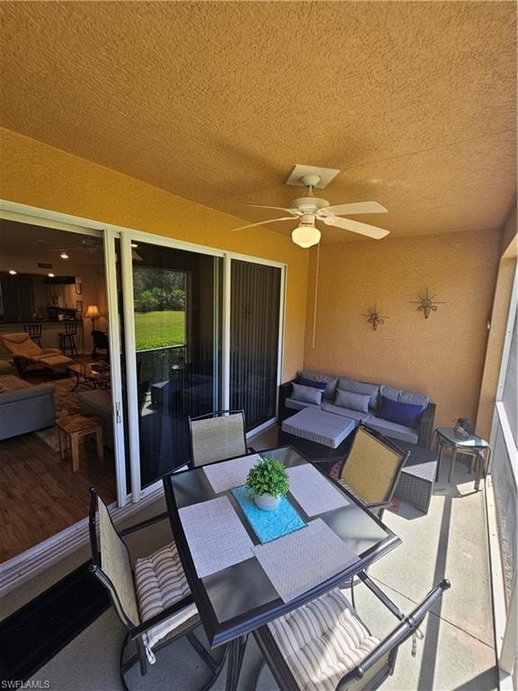 View of patio / terrace featuring ceiling fan and an outdoor hangout area