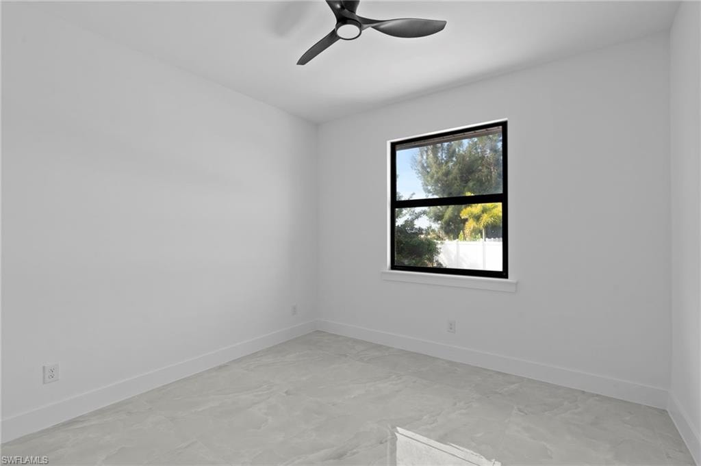 Unfurnished room with ceiling fan
