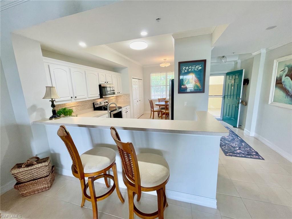 Kitchen featuring Breakfast Bar