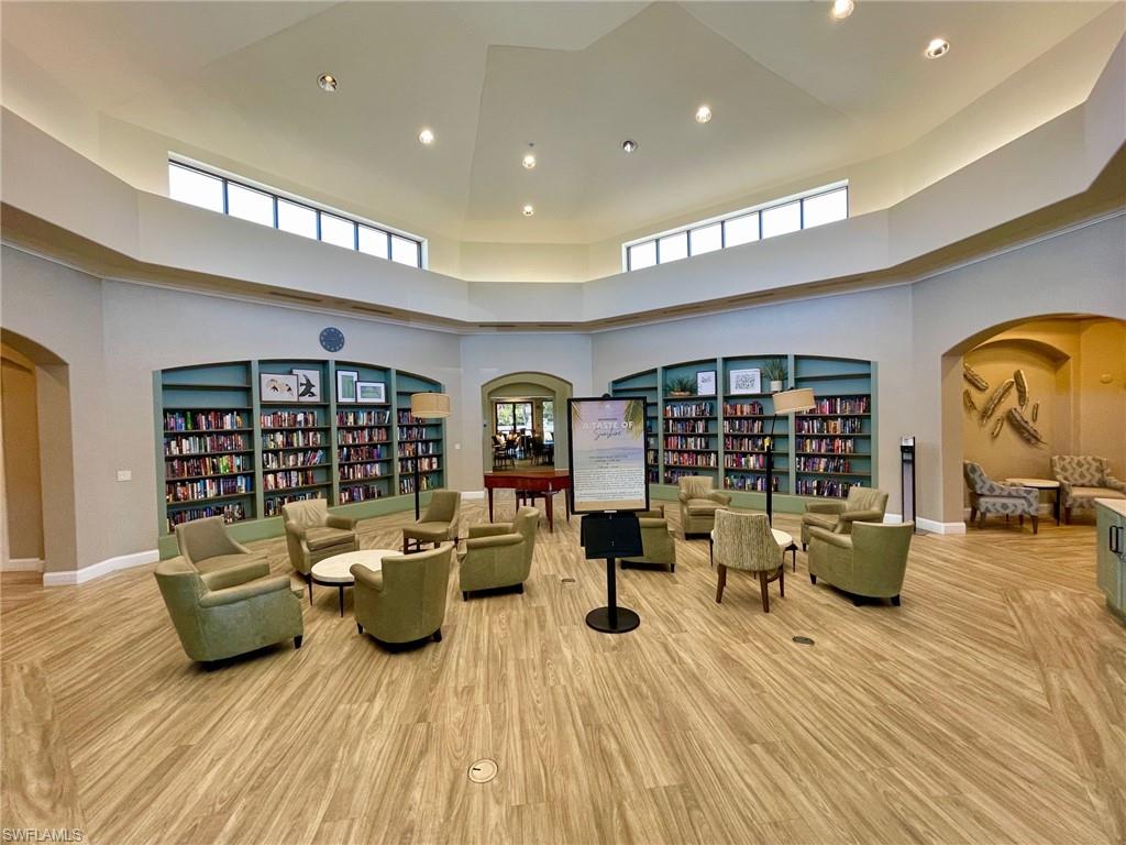 Spacious library, gaming, and social building with business center