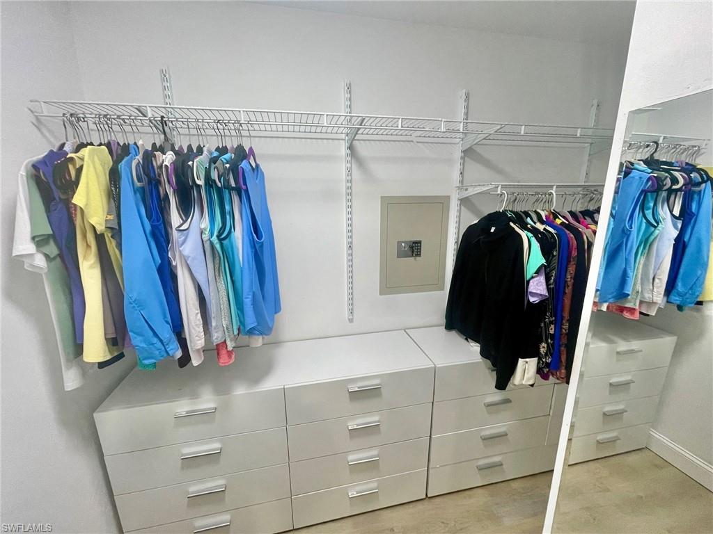 Master Closet With Built-In Wall Safe