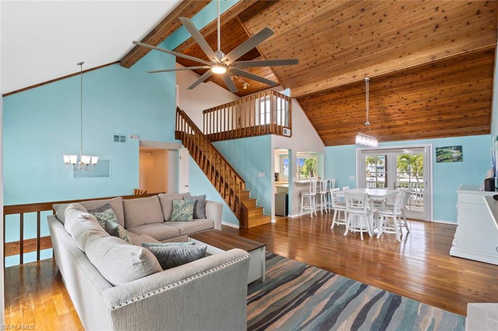 Main living area with soaring ceilings.