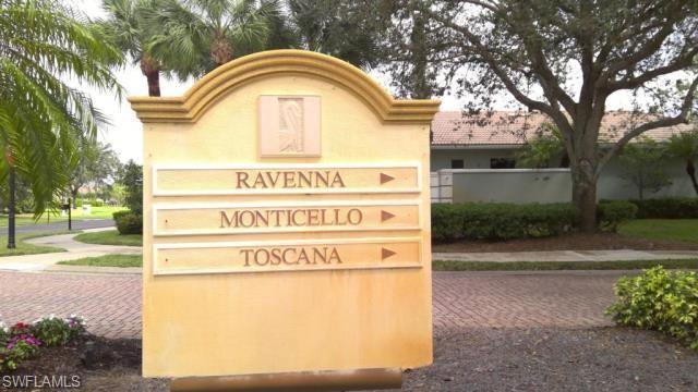 Community sign with decorative driveway