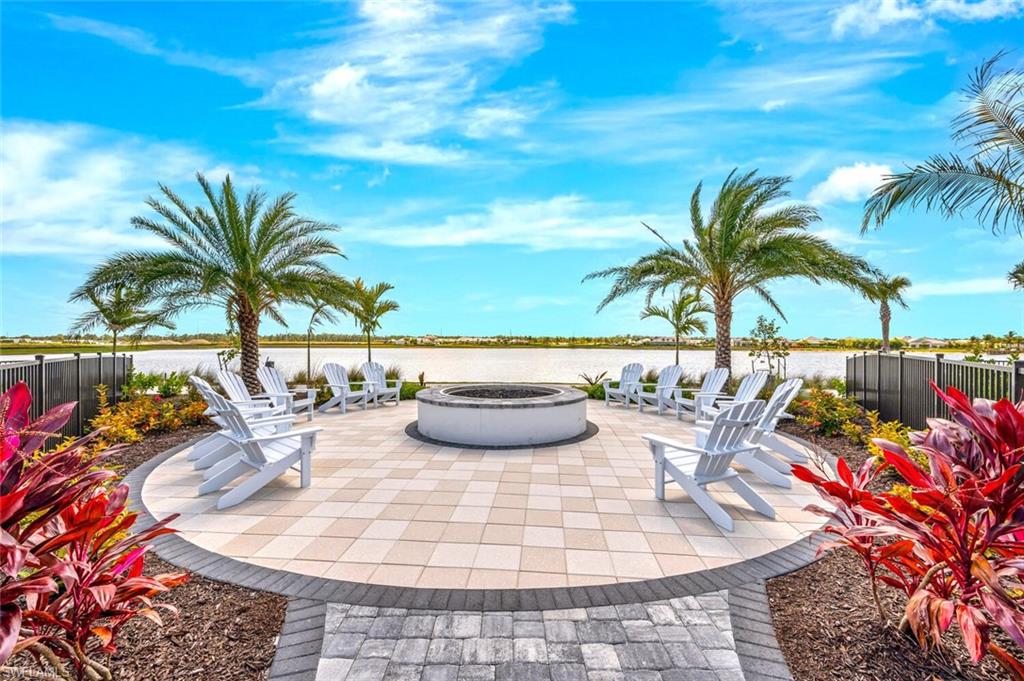 View of patio with an outdoor fire pit