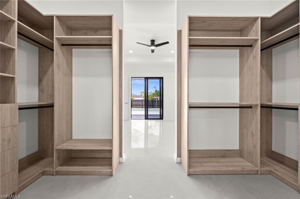 Custom closet system featuring wood-finish shelving and built-in drawers
