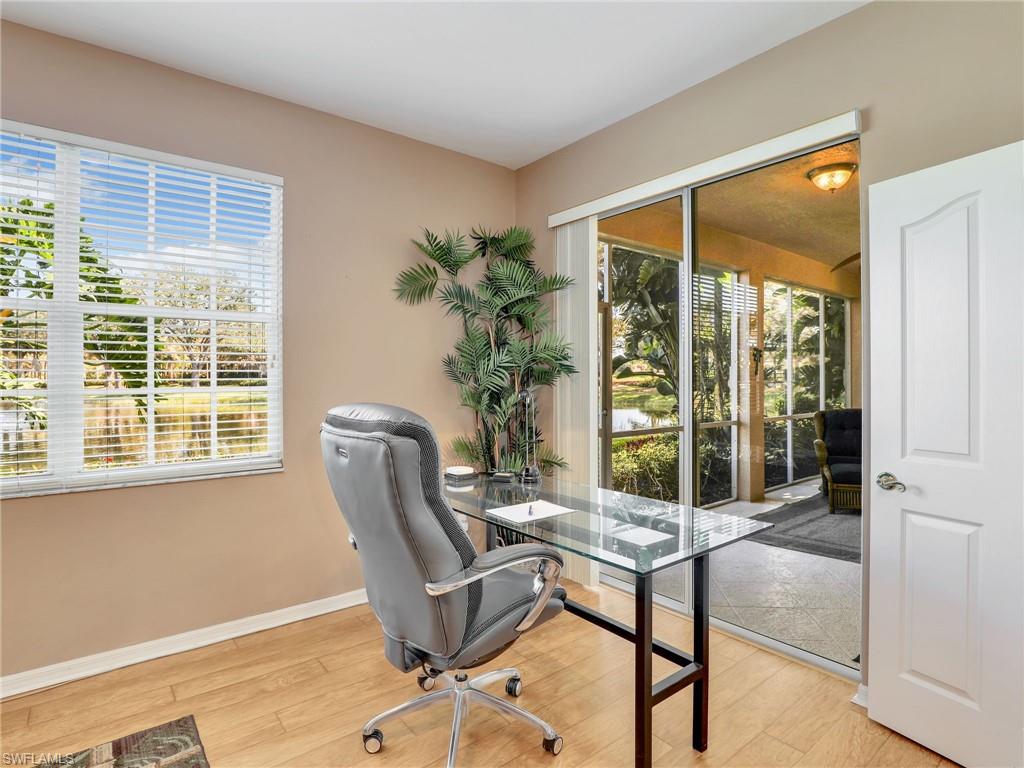 Primary Bedroom Showing Sliders To Lanai