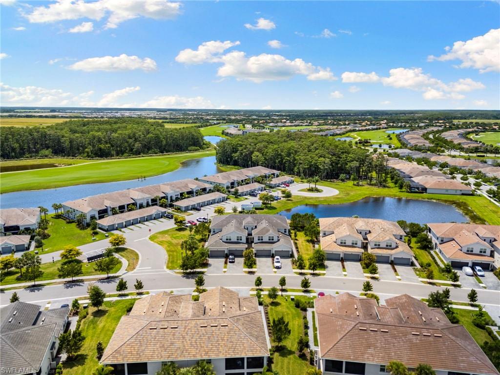 Aerial perspective showcasing residential properties and water features