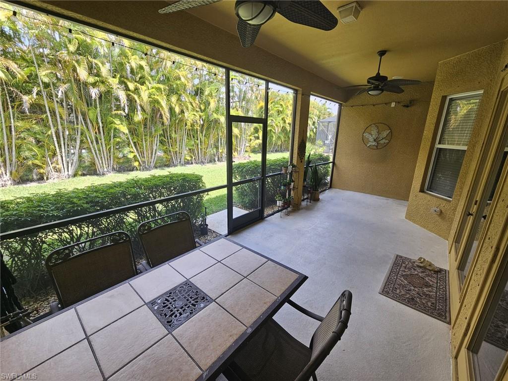 Screened patio with concrete flooring