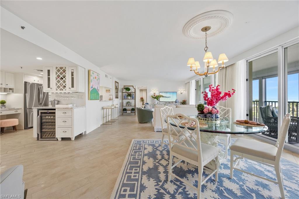 dining area with views of kitchen and living room.