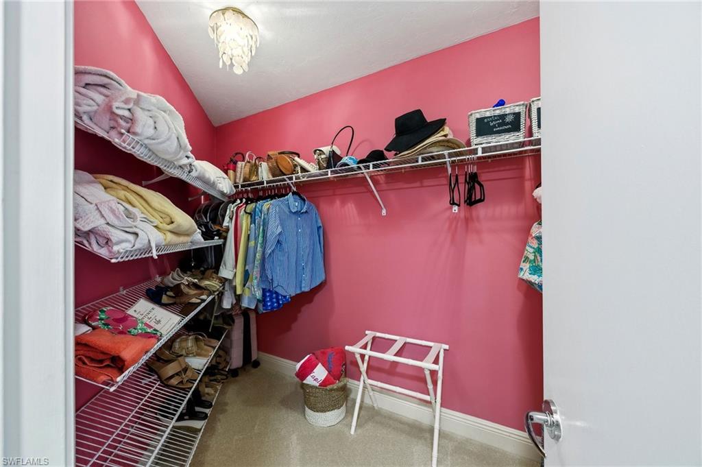 Closet in primary bedroom.