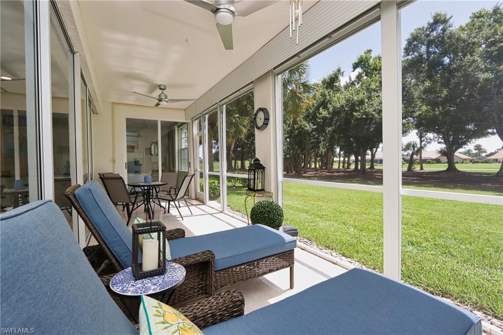 Sunroom / solarium with a healthy amount of sunlight and ceiling fan