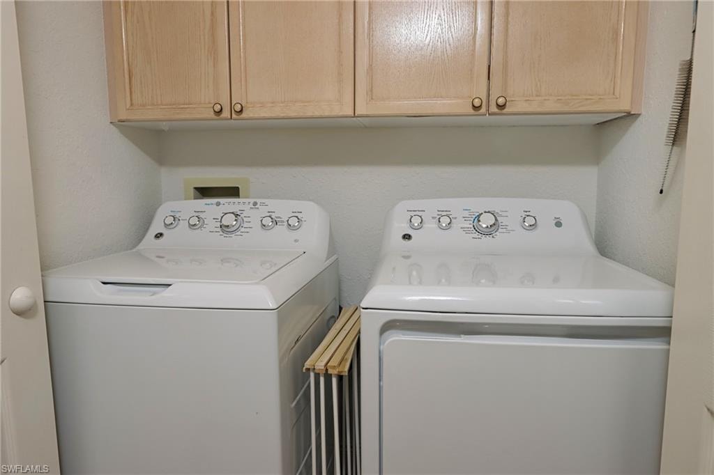 Laundry room with separate washer and dryer