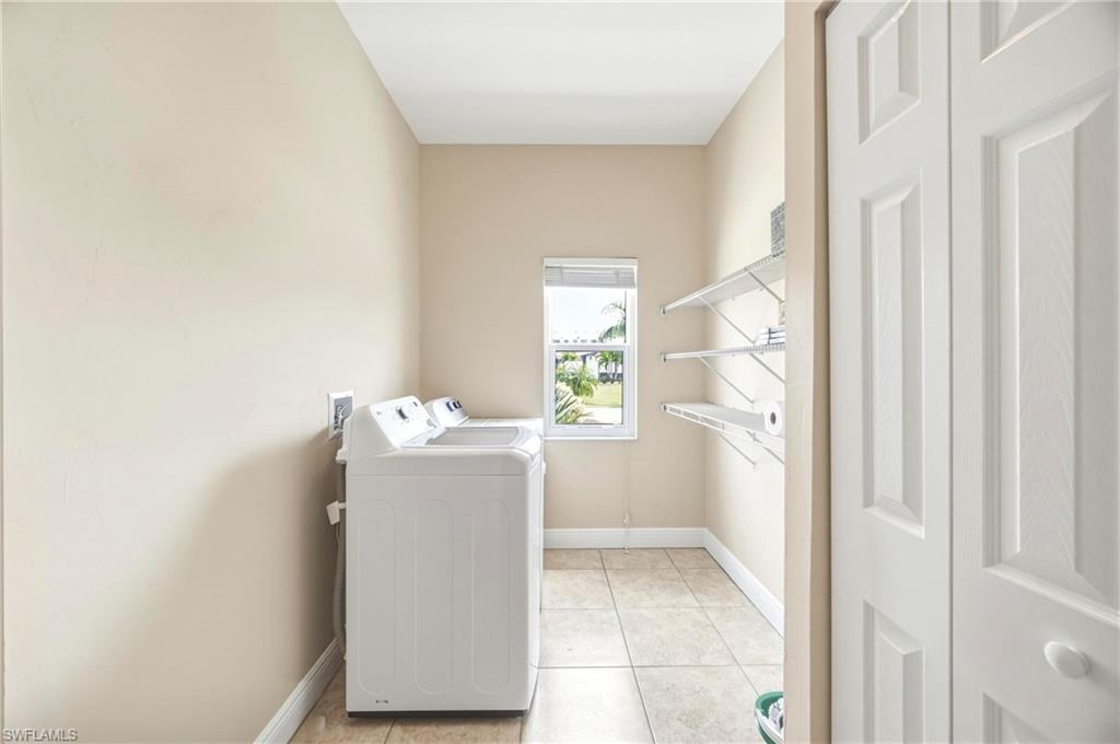 Laundry Room with Storage Shelves and Pantry