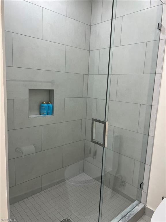 Bathroom with toilet and walk in shower